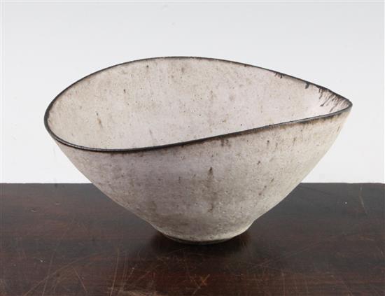 Dame Lucie Rie D.B.E. (1902-1995). A stoneware elliptical bowl, 20cm across, firing imperfection to one side